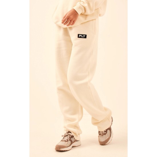 PRETTYLITTLETHING Cream Logo Badge Detail Straight Leg Sweatpants