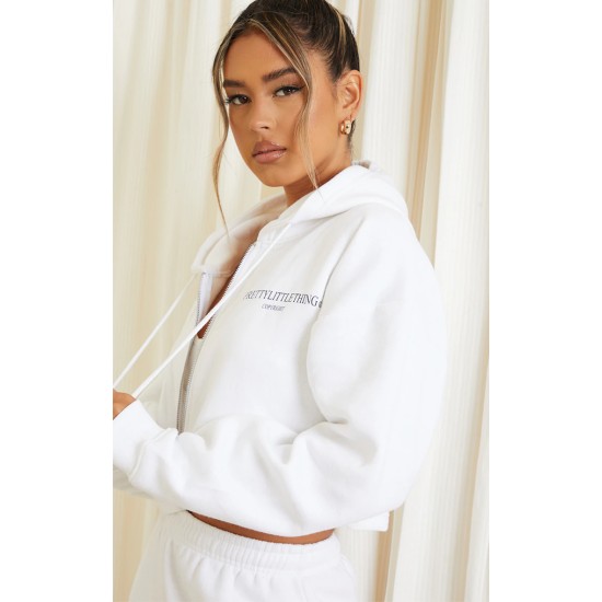 PRETTYLITTLETHING White Copyright Graphic Zip Through Crop Hoodie